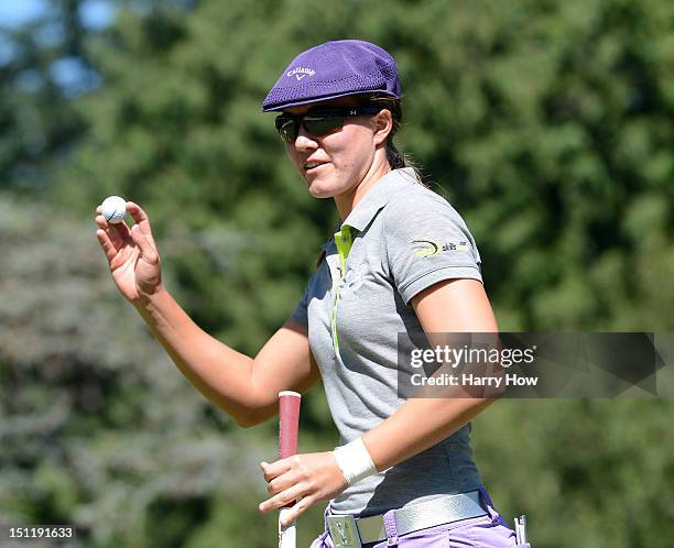 Vicky Hurst reacts to her birdie on the 16th green during round three of the Canadian Women's Open at The Vancouver Golf Club on August 25, 2012 in...