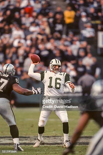 Vinny Testaverde of the New York Jets throws a pass during a National Football League game against the Oakland Raiders played on January 6, 2002 at...