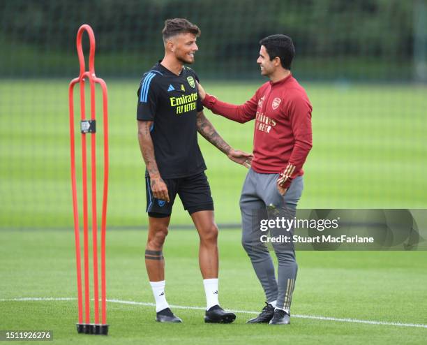 Arsenal manager Mikel Arteta with Ben White during a training session at London Colney on July 03, 2023 in St Albans, England.