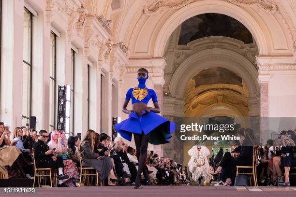 Model walks the runway during the Schiaparelli Haute Couture Fall/Winter 2023/2024 show as part of Paris Fashion Week on July 03, 2023 in Paris,...