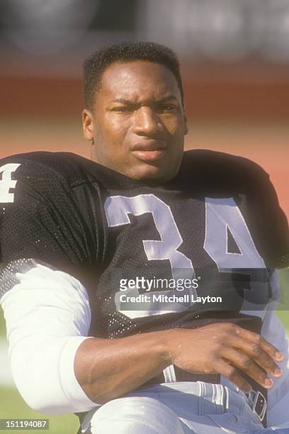 Bo Jackson of the Los Angeles Raiders warms up before a football game against the Atlanta Falcons on November 20, 1988 at Los Angeles Colliseum in...