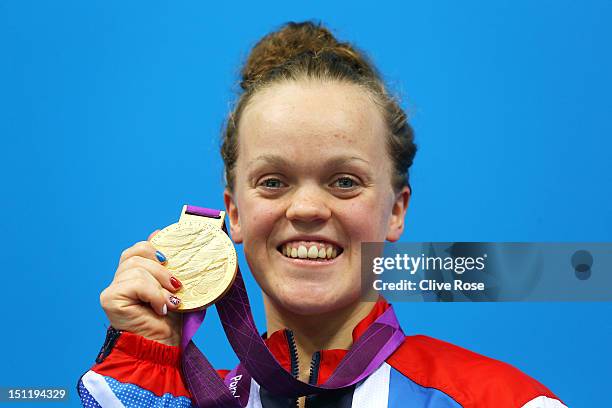 Gold medallist Eleanor Simmonds of Great Britain poses on the podium during the medal ceremony for the Women's 200m Individual Medley - SM6 finalon...