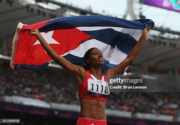Omara Durand of Cuba celebrates winning gold in the Women's 400m - T13 Final on day 5 of the London 2012 Paralympic Games at Olympic Stadium on...
