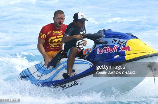 Former ASP world number two Australian Luke Egan bleeds while on a Tahitian Water Patrol JetSki after suffering a serious wipeout and was eliminated...