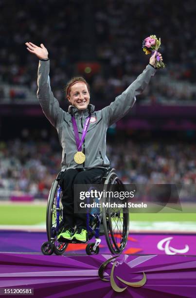 Gold medalist Tatyana Mcfadden of the United States poses on the podium during the medal ceremony for the Women's 400m - T54 Final on day 5 of the...