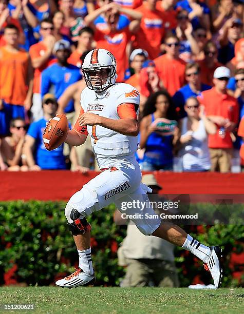 Matt Schilz of the Bowling Green Falcons attempts a pass during the game against the Florida Gators at Ben Hill Griffin Stadium on September 1, 2012...