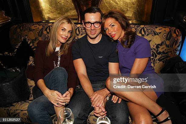 Kim Hersov, Erdem Moralioglu and Heather Kerzner attends the nominees party for The British Fashion Awards on September 3, 2012 in London, England.