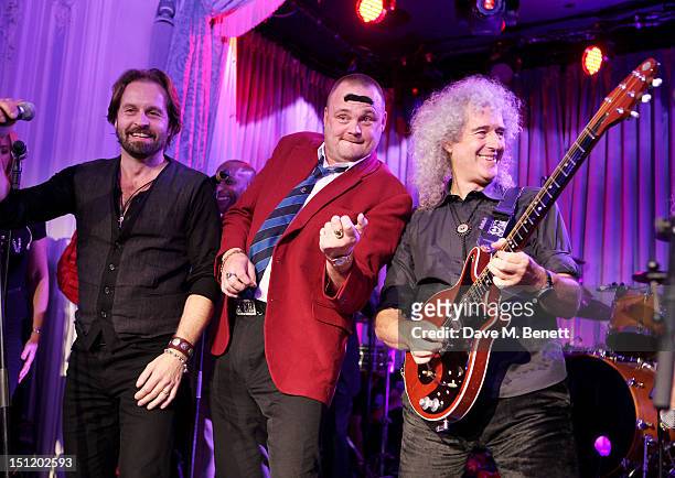 Alfie Boe, Al Murray and Brian May perform during the second annual "Freddie For A Day" event in memory of Queen's late frontman Freddie Mercury, at...