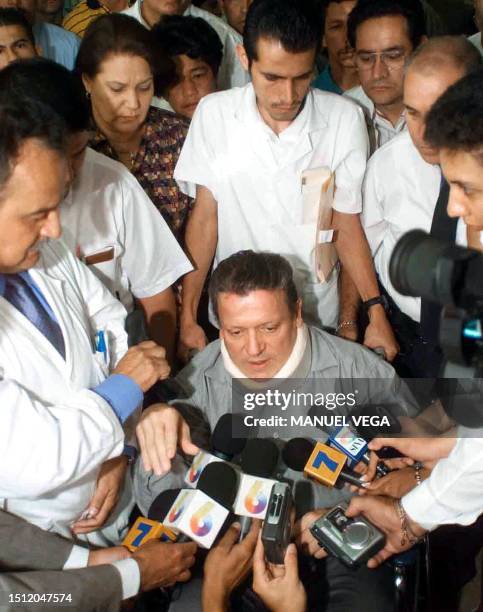 The presidential candidate Rolando Araya is seen speaking to the press, 09 April 2002 after he lost the elections in Costa Rica against Abel Pacheco....