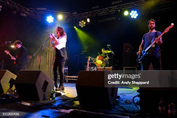 Hannah Thurlow, Colette Thurlow, Alex Robins and Joel Porter of the band 2:54 perform on stage during Reading Festival 2012 at Richfield Avenue on...