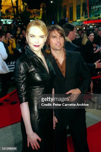 Actor Tom Cruise and his wife Nicole Kidman arrive for the premiere of his new film 'Mission Impossible 2' at Fox Studios on May 30, 2000 in Sydney,...
