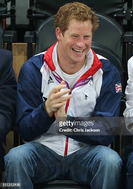 Prince Harry celebrates as Team GB scores as he attends the Goalball on day 6 of the London 2012 Paralympic Games at The Copper Box on September 4,...