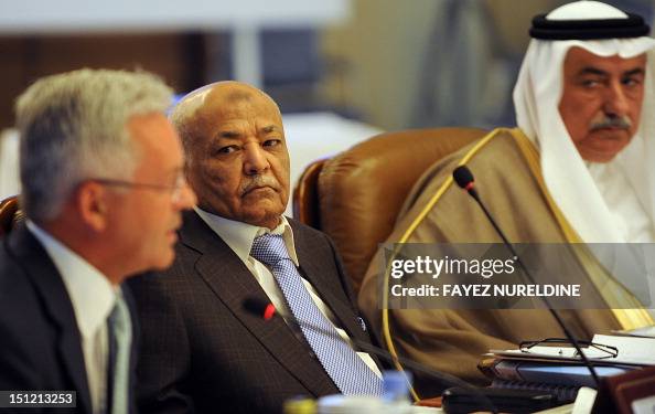 Yemen's Prime Minister Mohammed Basindawa and Saudi Arabia's Finance