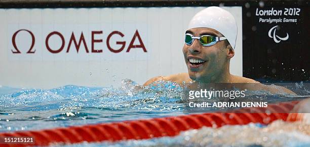 Brazil's Daniel Dias wins his men's 100 metres breaststroke heat SB4 category at the swimming competition during the London 2012 Paralympic Games at...