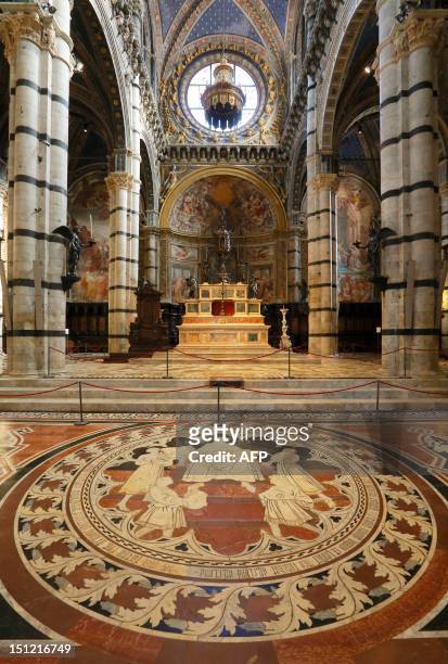 General view taken on August 30, 2012 shows details of the mosaic floor in the Siena cathedral. Magnificent Renaissance mosaics covering the sweeping...
