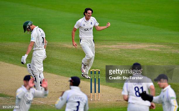 Warwickshire bowler Chris Wright celebrates after taking the wicket of Worcestershire batsman Matthew Pardoe during day one of the LV County...