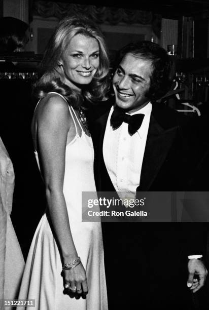 Singer Paul Anka and wife Anne DeZogheb attending "Legends Fashion Show" on November 5, 1974 at the Waldorf Hotel in New York City, New York.