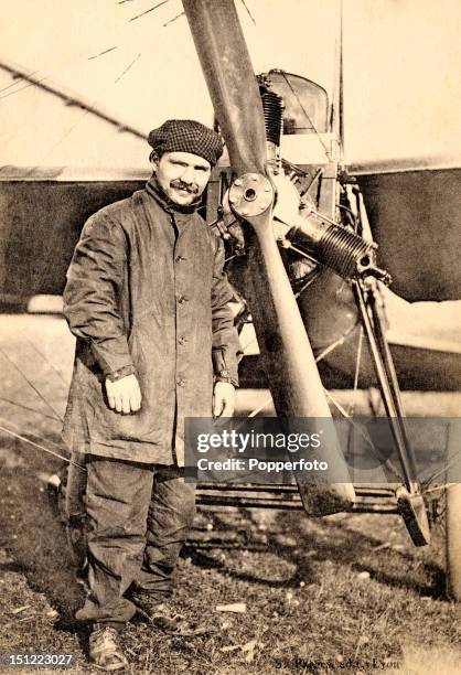 Vintage postcard featuring French aviator Marius Lacrouze standing with his Deperdussin monoplane near Reims, circa 1910.