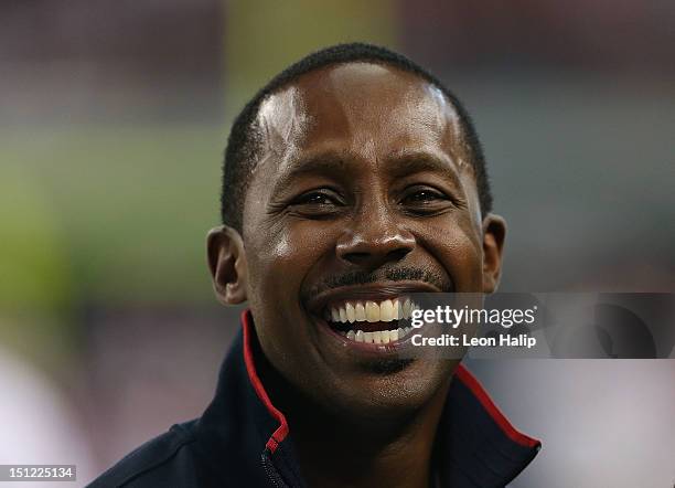 Former University of Michigan player Desmond Howard watches the action on the field during the game between the University of Alabama and the...