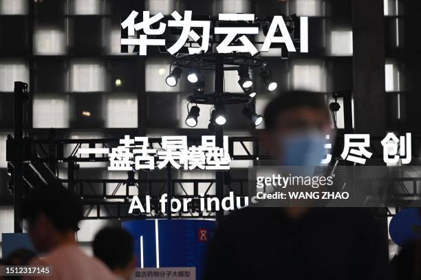 People visit the AI produce during World Artificial Intelligence Conference in Shanghai on July 7, 2023.