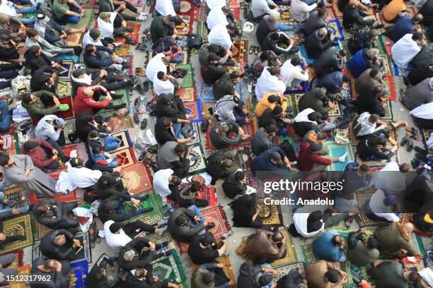 Supporters of Iraq's Shia cleric Muqtada al-Sadr and Sunni people gather to perform 'Joint Friday prayer' on January 13 in Baghdad, Iraq.