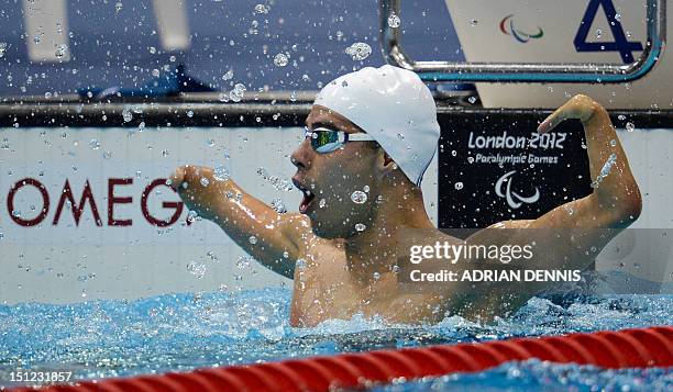 Brazil's Daniel Dias celebrates winning the Men's 100 metres Breaststroke Final SB4 category during the London 2012 Paralympic Games at the Aquatics...