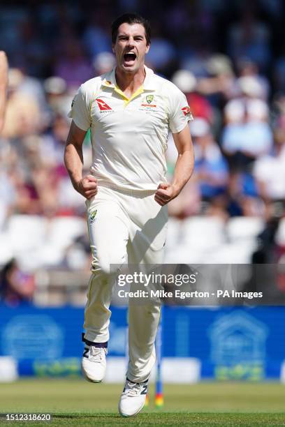 Australia's Patrick Cummins celebrates after taking the wicket of England's Joe Root during day two of the third Ashes test match at Headingley,...