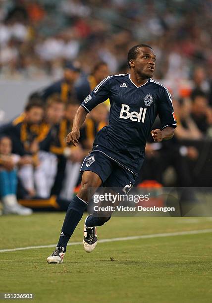 Dane Richards of the Vancouver Whitecaps tracks the ball in the first half during the MLS match against the Los Angeles Galaxy at The Home Depot...