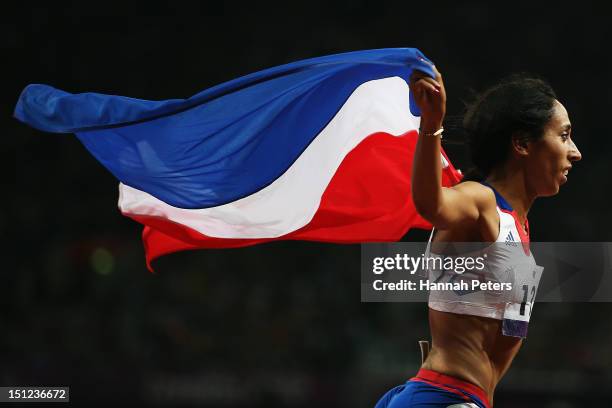 Assia El Hannouni of France celebrates winning the Women's 400m ¿ T12 final on day 6 of the London 2012 Paralympic Games at Olympic Stadium on...