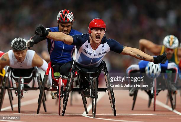 David Weir of Great Britain crosses the line to win gold in the Men's 1500m - T54 Final on day 6 of the London 2012 Paralympic Games at Olympic...