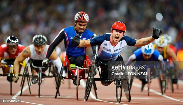 Team GB's David Weir celebrates after winning the gold medal in the men's 1500m T54 final at the Paralympic Games at the Olympic Park in east London,...