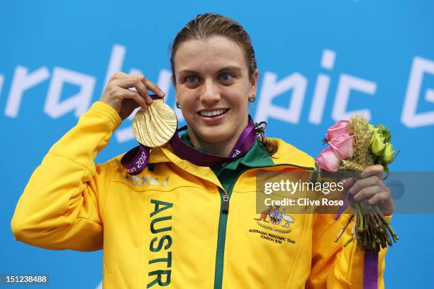 Gold medallist Jacqueline Freney of Australia poses on the podium during the medal ceremony for the Women's 50m Freestyle - S7 final on day 6 of the...