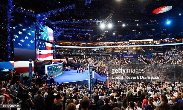 General view as Glee actress Amber Riley sings the national anthem during day one of the Democratic National Convention at Time Warner Cable Arena...