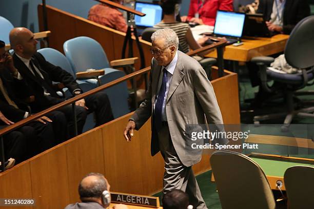 United Nations new envoy to Syria Lakhdar Brahimi walks off stage after addressing the U.N. General Assembly on September 4, 2012 in New York City....