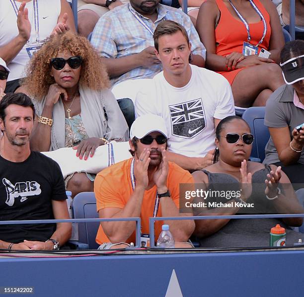 Model Elio Pis , Oracene Price , and Isha Price are sighted watching the Venus Williams vs. Angelique Kerber tennis match at the US Open at USTA...