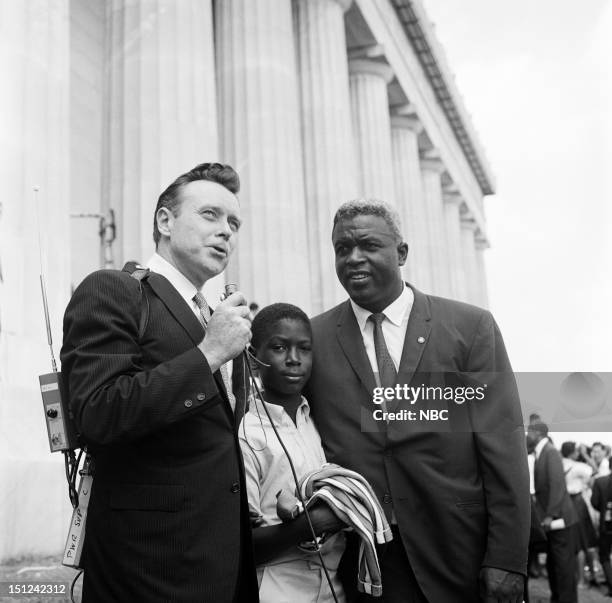 News -- MARCH ON WASHINGTON FOR JOBS AND FREEDOM 1968 -- Pictured: NBC News' Merrill "Red" Mueller, son David Robinson, baseball player Jackie...