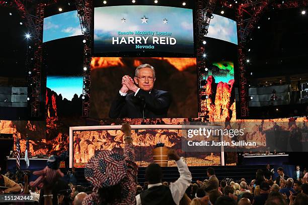 Senate Majority Leader Sen. Harry Reid gestures at the podium during day one of the Democratic National Convention at Time Warner Cable Arena on...