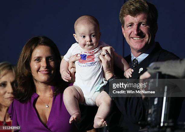 Representative Patrick Kennedy and wife Amy Petitgout with son, Owen Patrick during day one of the Democratic National Convention at Time Warner...