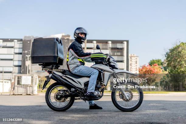 motoboy portrait - motoboy stock pictures, royalty-free photos & images