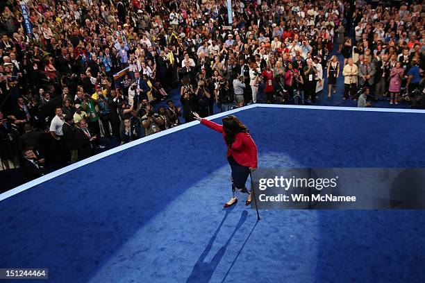 Illinois nominee for Congress Tammy Duckworth leaves the stage after speaking during day one of the Democratic National Convention at Time Warner...