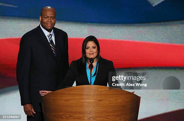 First lady Michelle Obama's brother Craig Robinson and U.S. President Barack Obama's sister Dr. Maya Kassandra Soetoro-Ng speak on stage during day...