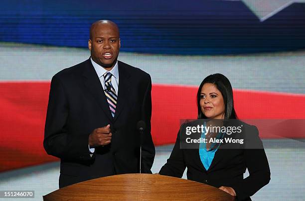 First lady Michelle Obama's brother Craig Robinson and U.S. President Barack Obama's sister Dr. Maya Kassandra Soetoro-Ng speak on stage during day...