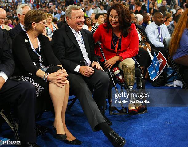 Sen. Dick Durbin talks with Illinois nominee for Congress Tammy Duckworth during day one of the Democratic National Convention at Time Warner Cable...