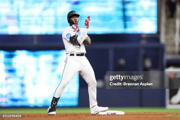 Jesus Sanchez of the Miami Marlins celebrates a hit in the first inning against the St. Louis Cardinals at loanDepot park on July 03, 2023 in Miami,...