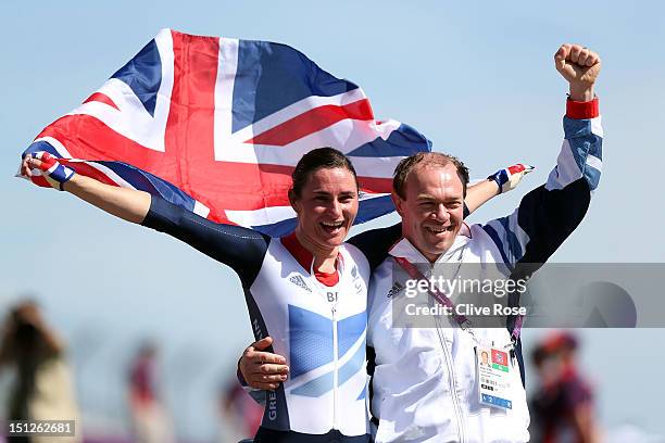 Sarah Storey of Great Britain celebrates with husband Barney after winning the Women's Individual Time Trial - C5 on day 7 of the London 2012...