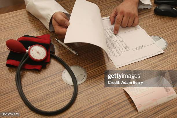 Doctor speaks with a patient about her high blood pressure, or hypertension, on September 5, 2012 in Berlin, Germany. Doctors in the country are...