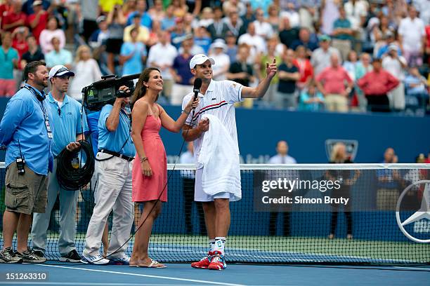 Andy Roddick victorious, talking with CBS Sports analyst Mary Joe Fernandez after winning Men's 3rd Round match vs Italy Fabio Fognini at BJK...