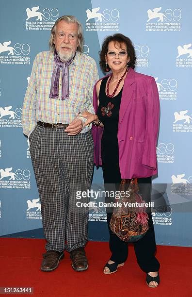 Actor Michael Lonsdale and actress Claudia Cardinale attends "O Gebo E A Sombra" Photocall during The 69th Venice Film Festival at the Palazzo del...