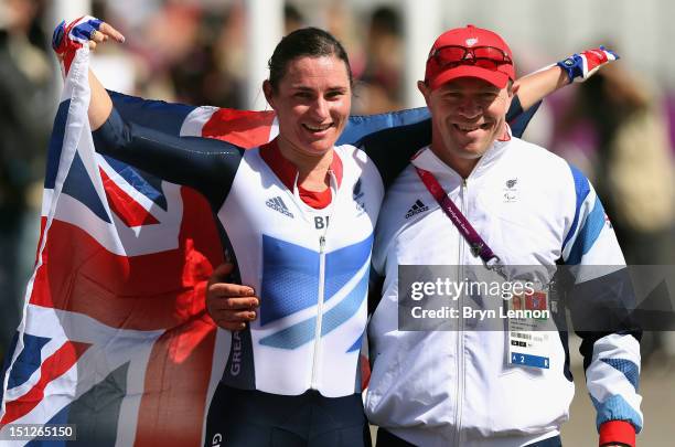 Sarah Storey of Team GB celebrates with husband Barney after winning the Women's Individual C5 Time Trial on day 7 of the London 2012 Paralympic...