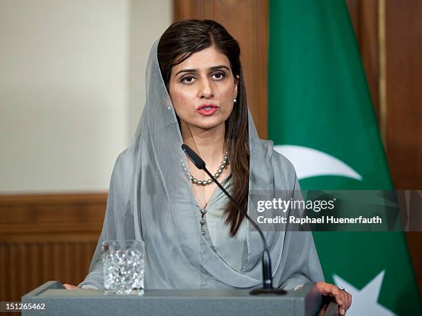 German Foreign Minister Guido Westerwelle talks with Pakistan Foreign Minister Hina Rabbani Khar in the garden of the Villa Borsig in Berlin on...